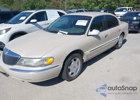 2000 Lincoln Continental из США, поврежденный, VIN 1LNHM97V8YY763843